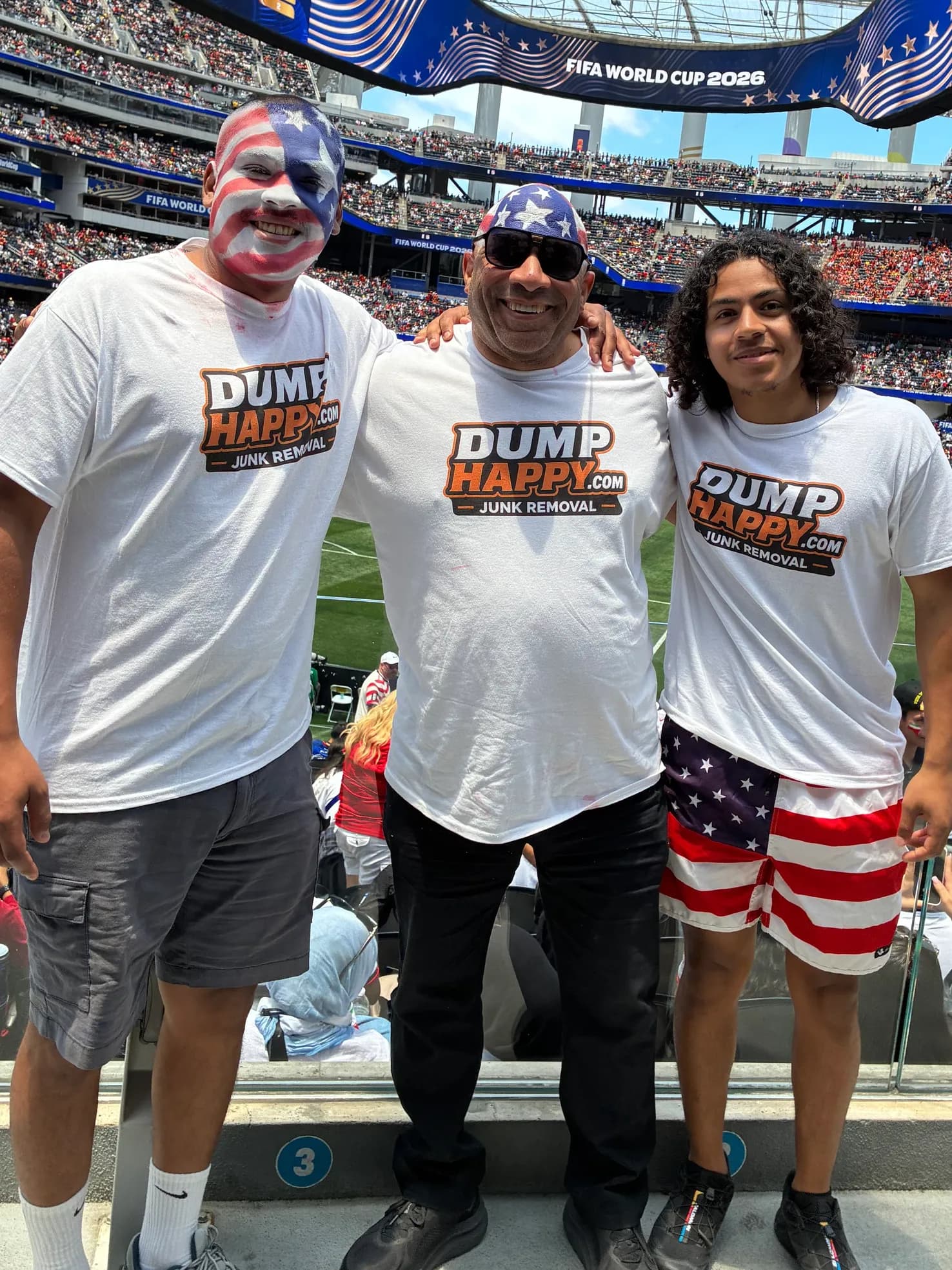 The Dump Happy team wearing Dump Happy Junk Removal t-shirts